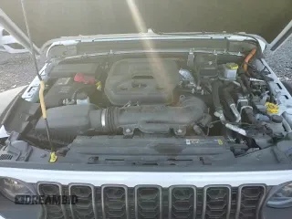 2024 Jeep Wrangler Rubicon с VIN 1C4RJXR65RW223679, выставлен на аукционе Copart как лот 89505645 с пробегом 38 919 миль миль и Списание • Salvage title. История ставок и продаж доступна на DreamBid. Изображение 13.