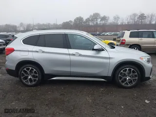 2021 BMW X1 xDrive28i with VIN WBXJG9C04M5T79810, listed as a IAAI auction lot 41471536 with 75,345 mi miles. Bid and sale history available at carsss.com. Image 13.
