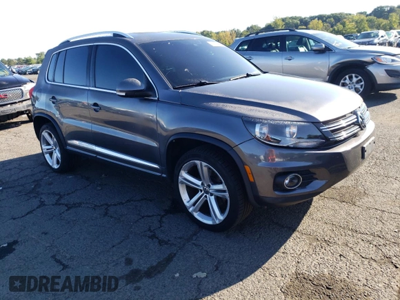 2016 Volkswagen Tiguan SE with VIN WVGBV7AX6GW052539, listed as a Copart auction lot 70010574 with 124,622 mi miles and Clean Title. Bid and sale history available at DreamBid. Image 4.