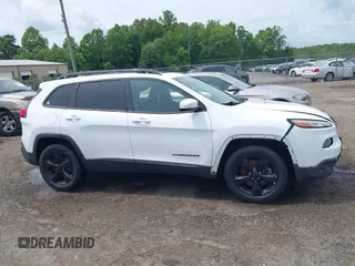 2016 Jeep Cherokee Altitude with VIN 1C4PJMCB3GW121211, listed as a IAAI auction lot 42470241 with 168,343 mi miles and . Bid and sale history available at DreamBid. Image 13.