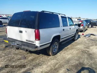 1996 Chevrolet Suburban with VIN 3GNFK16RXTG135350, listed as a IAAI auction lot 41482918 with 157,971 mi miles. Bid and sale history available at carsss.com. Image 4.