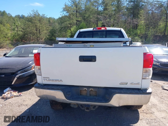 2010 Toyota Tundra z VIN 5TFUW5F15AX148425, wystawiony jako IAAI lot #41829616 z przebiegiem 125 623 mil mil oraz . Historia ofert i sprzedaży dostępna na DreamBid. Obrazek 16.