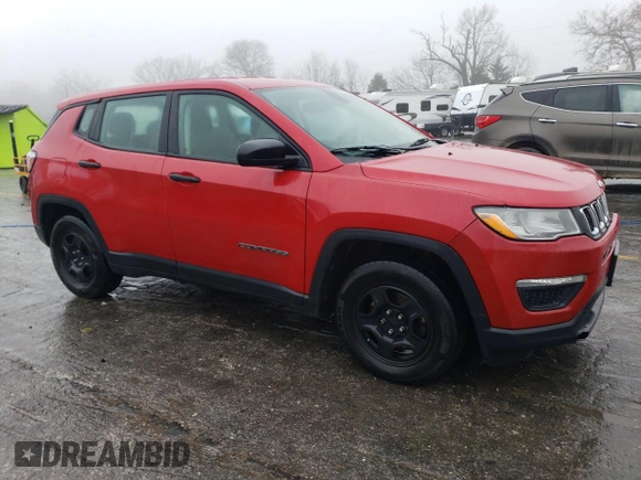 2017 Jeep Compass Sport with VIN 3C4NJCAB7HT668302, listed as a Copart auction lot 86572424 with 217,437 mi miles and Salvage Title. Bid and sale history available at carsss.com. Image 4.
