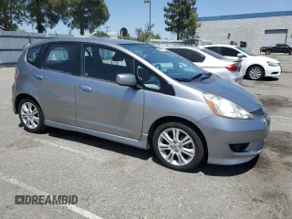2010 Honda Fit Sport with VIN JHMGE8H69AS025801, listed as a Copart auction lot 58416375 with 216,216 mi miles and Clean title. Bid and sale history available at DreamBid. Image 4.
