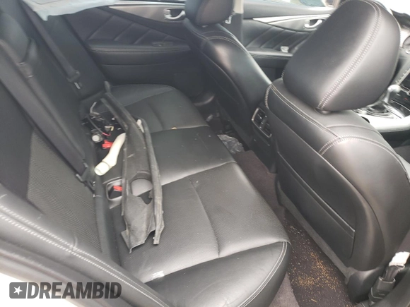 2014 Infiniti Q50 Premium with VIN JN1BV7AP1EM693338, listed as a Copart auction lot 58061545 with 97,290 mi miles and Salvage title. Bid and sale history available at DreamBid. Image 10.