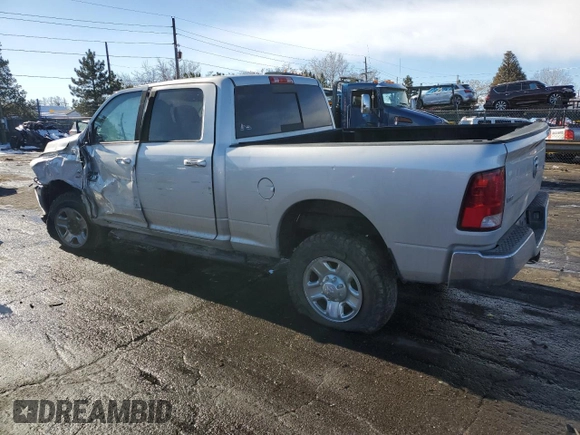 2016 Ram 2500 SLT with VIN 3C6UR5DL0GG328573, listed as a Copart auction lot 83420694 with 185,571 mi miles and Salvage Title. Bid and sale history available at carsss.com. Image 2.