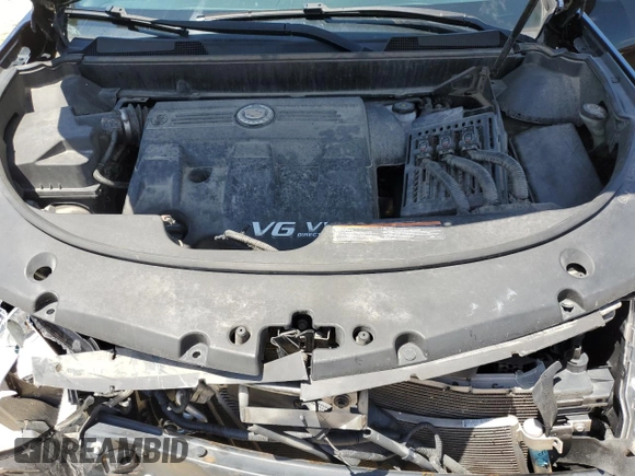 2012 Cadillac SRX Premium Collection with VIN 3GYFNFE32CS549742, listed as a Copart auction lot 63304675 with 114,627 mi miles and Salvage title. Bid and sale history available at DreamBid. Image 12.