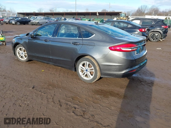 2018 Ford Fusion SE z VIN 3FA6P0HD7JR259606, wystawiony jako IAAI lot #41649797 z przebiegiem 94 094 mil mil oraz . Historia ofert i sprzedaży dostępna na DreamBid. Obrazek 3.