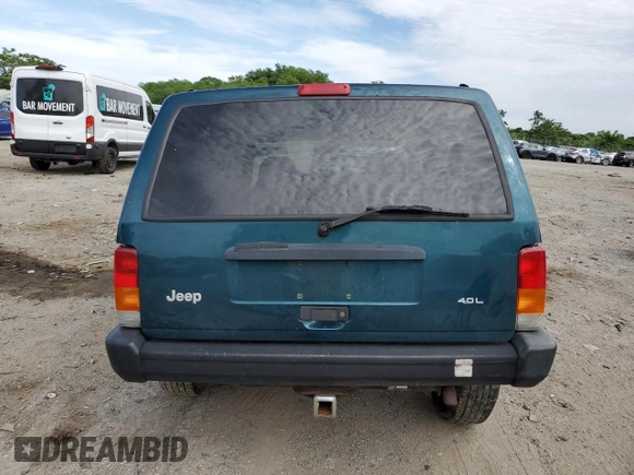 1998 Jeep Cherokee Sport z VIN 1J4FJ68S4WL101110, wystawiony jako Copart lot #57696755 z przebiegiem 218 254 mil mil oraz Szkoda całkowita • Salvage title. Historia ofert i sprzedaży dostępna na DreamBid. Obrazek 6.