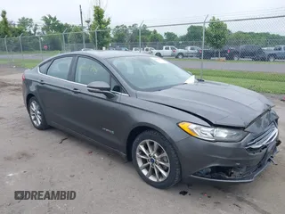 2017 Ford Fusion Hybrid SE with VIN 3FA6P0LU2HR301083, listed as a IAAI auction lot 42602798 with 89,003 mi miles and . Bid and sale history available at DreamBid. Image 1.