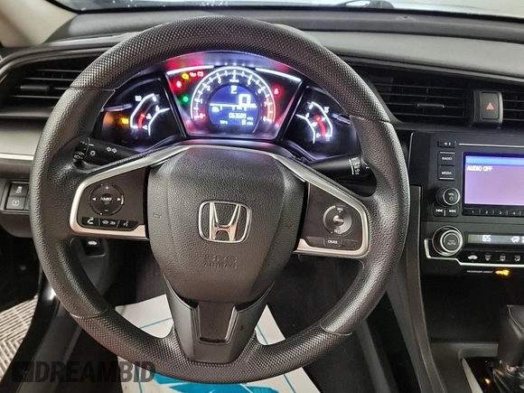 2017 Honda Civic LX with VIN 2HGFC2F58HH575889, listed as a IAAI auction lot 42285632 with 63,687 mi miles and . Bid and sale history available at DreamBid. Image 12.