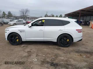 2024 Genesis GV80 z VIN KMUHBDSB9RU150422, wystawiony jako IAAI lot #41527174 z przebiegiem 41 956 mil mil oraz . Historia ofert i sprzedaży dostępna na DreamBid. Obrazek 14.
