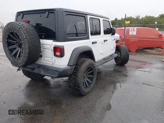 2019 Jeep Wrangler Unlimited Sport Altitude with VIN 1C4HJXDG3KW528647, listed as a IAAI auction lot 40986538 with 85,381 mi miles and . Bid and sale history available at DreamBid. Image 4.