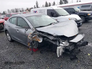 2014 Mazda 3 i Grand Touring with VIN JM1BM1W73E1214537, listed as a IAAI auction lot 41586529 with Not Provided miles. Bid and sale history available at carsss.com. Image 1.