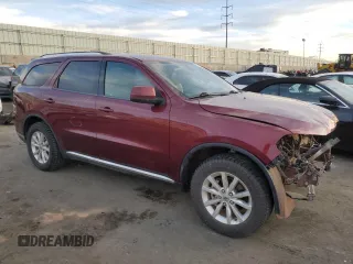 2019 Dodge Durango SXT Plus with VIN 1C4RDJAG1KC576310, listed as a Copart auction lot 84942544 with 126,389 mi miles and Salvage title. Bid and sale history available at DreamBid. Image 4.
