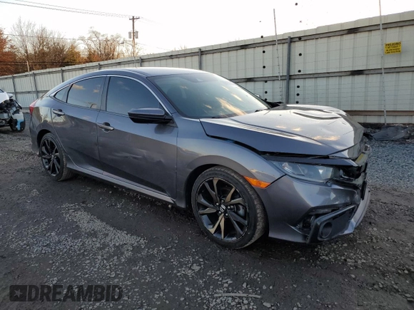 2019 Honda Civic Sport with VIN 2HGFC2F84KH507235, listed as a Copart auction lot 82616034 with 95,751 mi miles and Salvage title. Bid and sale history available at DreamBid. Image 4.
