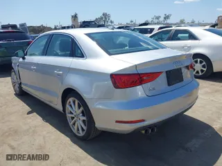 2015 Audi A3 1.8T Premium with VIN WAUACGFF2F1001604, listed as a IAAI auction lot 41975125 with 128,136 mi miles. Bid and sale history available at carsss.com. Image 3.