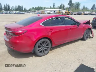 2016 Mazda 6 i Grand Touring с VIN JM1GJ1W52G1403034, выставлен на аукционе IAAI как лот 42238556 с пробегом 141 470 миль миль и . История ставок и продаж доступна на DreamBid. Изображение 4.
