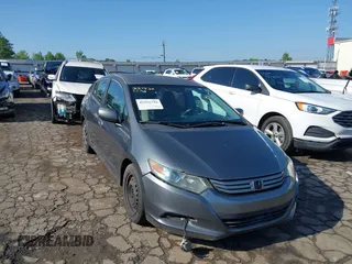 2010 Honda Insight LX z VIN JHMZE2H52AS032697, wystawiony jako IAAI lot #42255794 z przebiegiem 262 251 mil mil oraz . Historia ofert i sprzedaży dostępna na DreamBid. Obrazek 1.