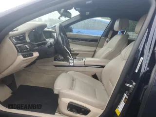 2015 BMW 7 Series 750Li z VIN WBAYE8C51FD781314, wystawiony jako Copart lot #56537395 z przebiegiem 69 682 mil mil oraz Szkoda całkowita • Salvage title. Historia ofert i sprzedaży dostępna na DreamBid. Obrazek 7.