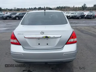 2007 Nissan Versa 1.8 SL with VIN 3N1BC11E97L447829, listed as a IAAI auction lot 41612386 with 123,500 mi miles. Bid and sale history available at carsss.com. Image 16.
