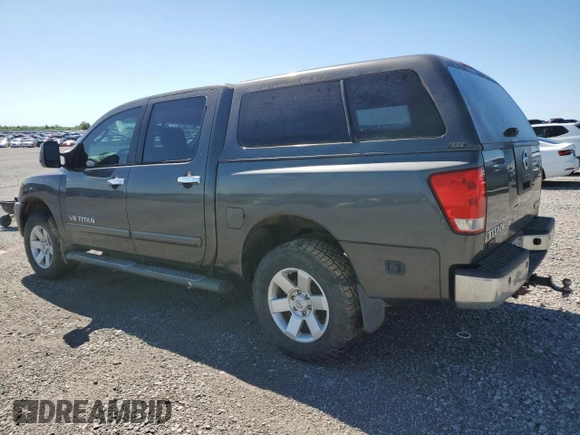 2005 Nissan Titan LE with VIN 1N6BA07B95N571880, listed as a Copart auction lot 57527435 with 199,577 mi miles and Salvage title. Bid and sale history available at DreamBid. Image 2.
