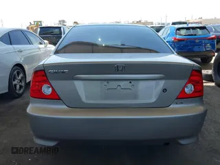 2004 Honda Civic LX with VIN 1HGEM22524L047504, listed as a IAAI auction lot 41990812 with 166,270 mi miles. Bid and sale history available at carsss.com. Image 17.