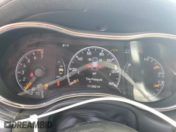 2015 Jeep Grand Cherokee Overland with VIN 1C4RJFCG6FC919637, listed as a Copart auction lot 52072925 with 111,552 mi miles and Salvage Title. Bid and sale history available at carsss.com. Image 9.