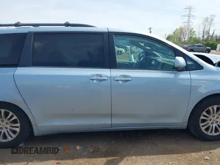 2015 Toyota Sienna XLE with VIN 5TDYK3DC3FS609947, listed as a IAAI auction lot 42097199 with Not provided miles and . Bid and sale history available at DreamBid. Image 14.