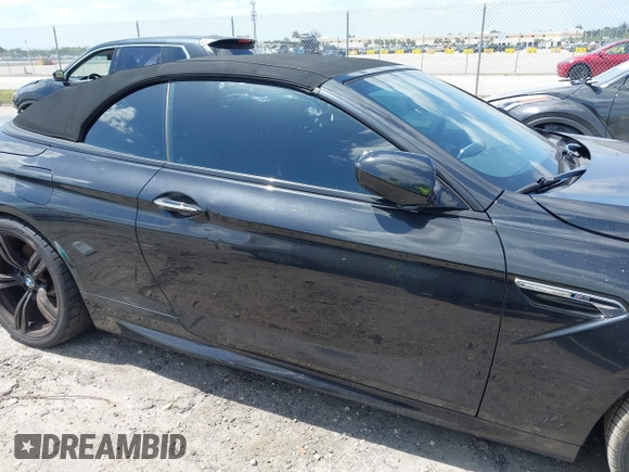 2014 BMW M6 with VIN WBSLZ9C52EDZ78748, listed as a IAAI auction lot 42152435 with 57,150 mi miles and . Bid and sale history available at DreamBid. Image 13.