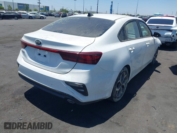 2021 Kia Forte LXS with VIN 3KPF24AD8ME403914, listed as a IAAI auction lot 42643903 with 34,305 mi miles and . Bid and sale history available at DreamBid. Image 4.