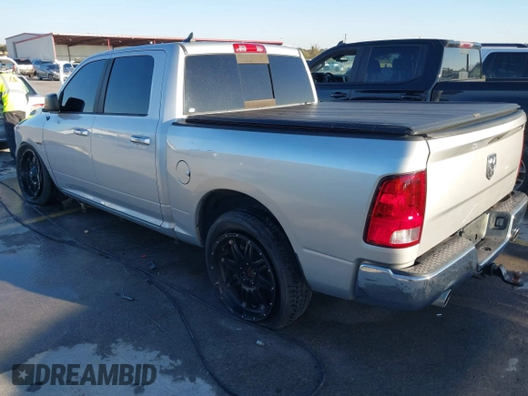 2014 Ram 1500 Big Horn with VIN 1C6RR6LT1ES180291, listed as a IAAI auction lot 40962366 with 131,763 mi miles and . Bid and sale history available at DreamBid. Image 3.