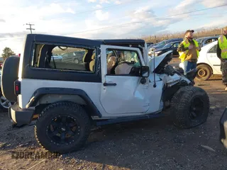 2015 Jeep Wrangler Sport with VIN 1C4AJWAG0FL516351, listed as a IAAI auction lot 41178594 with 49,700 mi miles and . Bid and sale history available at DreamBid. Image 12.