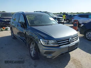 2021 Volkswagen Tiguan SE z VIN 3VV3B7AX9MM024121, wystawiony jako IAAI lot #42307879 z przebiegiem 52 952 mil mil oraz . Historia ofert i sprzedaży dostępna na DreamBid. Obrazek 1.
