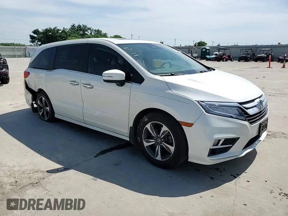 2019 Honda Odyssey Touring with VIN 5FNRL6H86KB089055, listed as a Copart auction lot 56980975 with 154,842 mi miles and Salvage title. Bid and sale history available at DreamBid. Image 14.