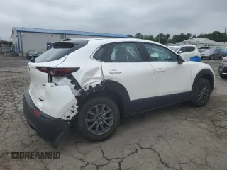 2023 Mazda CX-30 S with VIN 3MVDMBAM8PM557537, listed as a Copart auction lot 61154835 with 23,450 mi miles and Salvage title. Bid and sale history available at DreamBid. Image 3.