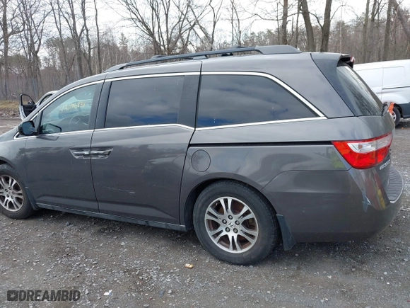 2012 Honda Odyssey EX with VIN 5FNRL5H42CB086159, listed as a IAAI auction lot 42096834 with 208,701 mi miles. Bid and sale history available at carsss.com. Image 14.
