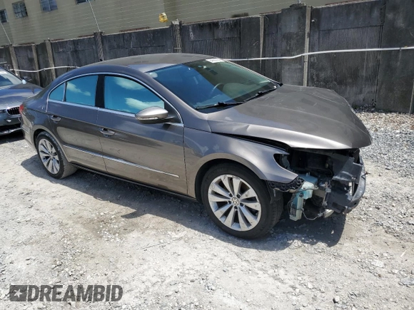 2012 Volkswagen CC Sport PZEV with VIN WVWMP7AN4CE516224, listed as a Copart auction lot 64900354 with 101,533 mi miles and Salvage Title. Bid and sale history available at carsss.com. Image 4.