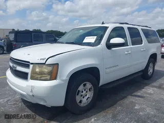 2009 Chevrolet Suburban LT w/2LT with VIN 1GNFC26JX9J108623, listed as a IAAI auction lot 42115456 with 144,370 mi miles. Bid and sale history available at carsss.com. Image 2.