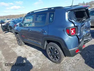2023 Jeep Renegade Trailhawk with VIN ZACNJDC13PPP74002, listed as a IAAI auction lot 41968140 with 6,848 mi miles and . Bid and sale history available at DreamBid. Image 3.