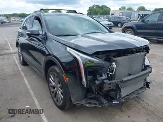 2023 Cadillac XT4 AWD Sport with VIN 1GYFZFR48PF108344, listed as a IAAI auction lot 42375815 with 28,200 mi miles and . Bid and sale history available at DreamBid. Image 1.