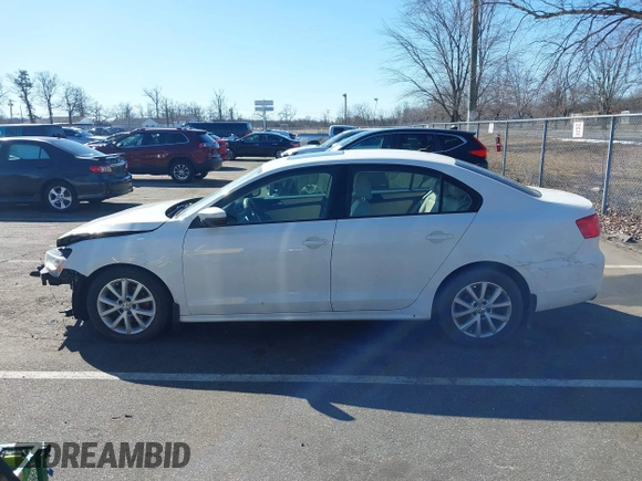 2012 Volkswagen Jetta Sedan SE w/Convenience PZEV with VIN 3VWDP7AJ2CM374783, listed as a IAAI auction lot 41636257 with 124,458 mi miles. Bid and sale history available at carsss.com. Image 14.