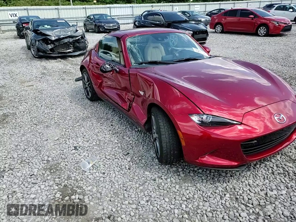 2020 Mazda MX-5 Miata Grand Touring z VIN JM1NDAM70L0414102, wystawiony jako Copart lot #55261575 z przebiegiem 70 157 mil mil oraz Szkoda całkowita • Salvage title. Historia ofert i sprzedaży dostępna na DreamBid. Obrazek 13.