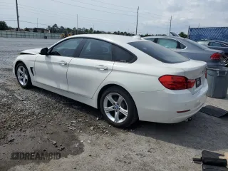 2015 BMW 4 Series 428i with VIN WBA4A9C59FGL85999, listed as a Copart auction lot 56275455 with 105,961 mi miles and Salvage title. Bid and sale history available at DreamBid. Image 2.