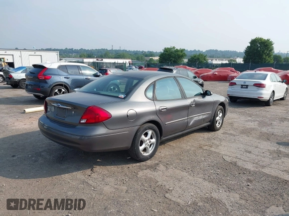 2003 Ford Taurus SE Standard with VIN 1FAFP53203G173180, listed as a IAAI auction lot 42495369 with 129,091 mi miles and . Bid and sale history available at DreamBid. Image 4.