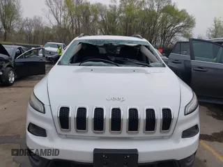 2016 Jeep Cherokee Sport with VIN 1C4PJLAB4GW229799, listed as a IAAI auction lot 41894502 with 117,651 mi miles. Bid and sale history available at carsss.com. Image 13.
