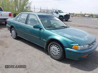 1992 Honda Accord z VIN 1HGCB7656NA183118, wystawiony jako IAAI lot #42024565 z przebiegiem 197 748 mil mil oraz . Historia ofert i sprzedaży dostępna na DreamBid. Obrazek 1.