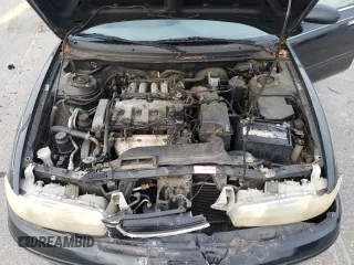 1996 Mazda 626 z VIN 1YVGE22C2T5585359, wystawiony jako Copart lot #74568444 z przebiegiem 159 922 mil mil oraz Szkody całkowita. Historia ofert i sprzedaży dostępna na DreamBid. Obrazek 13.