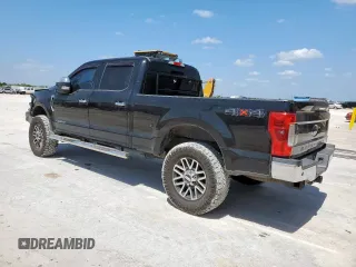 2017 Ford F-250 Lariat with VIN 1FT7W2BT2HEB92374, listed as a Copart auction lot 59897975 with 310,479 mi miles and Salvage title. Bid and sale history available at DreamBid. Image 2.