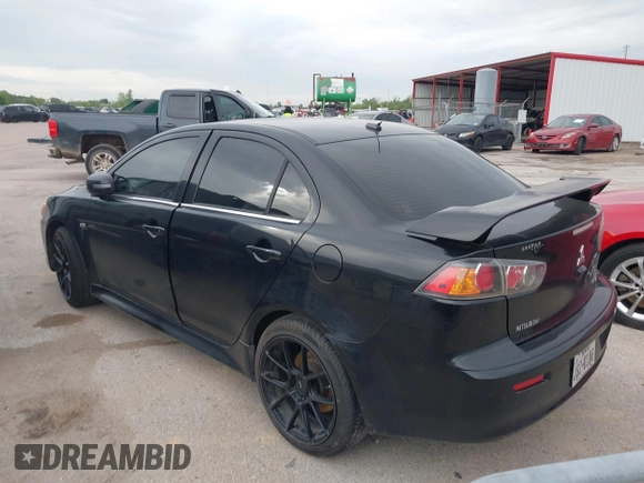 2016 Mitsubishi Lancer GT with VIN JA32U8FW8GU011501, listed as a IAAI auction lot 41779016 with 153,082 mi miles. Bid and sale history available at carsss.com. Image 3.